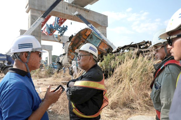 32 killed after crane falls on train